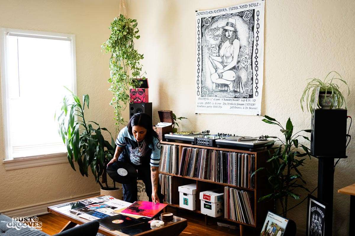 Melissa Dueñas, aka Sonrisita, a vinyl record collectors, photographed with her at her home in Los Angeles, CA for Dust & Grooves Volume 2 book.